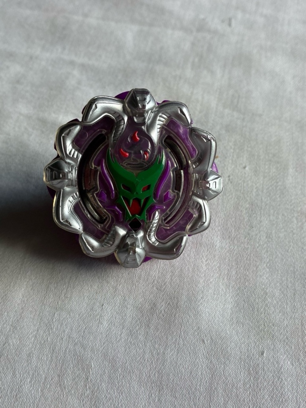 Purple and Green Beyblade